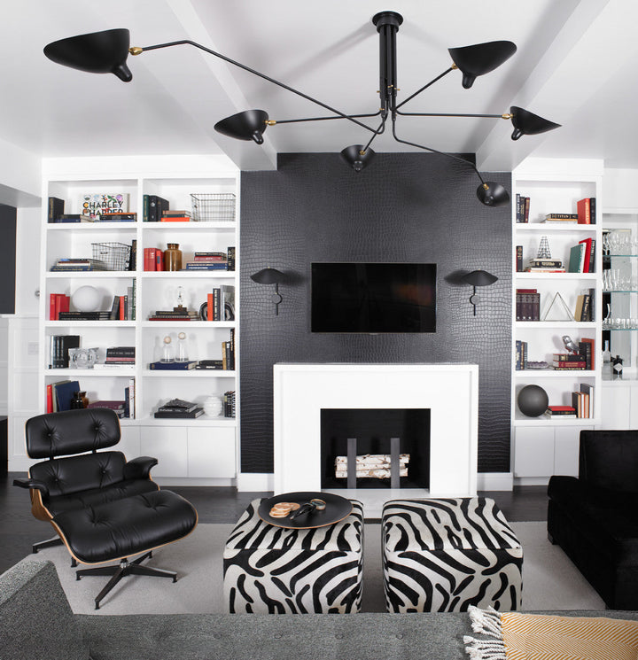 Modern adjustable multi-arm ceiling light, a versatile fixture for any room.