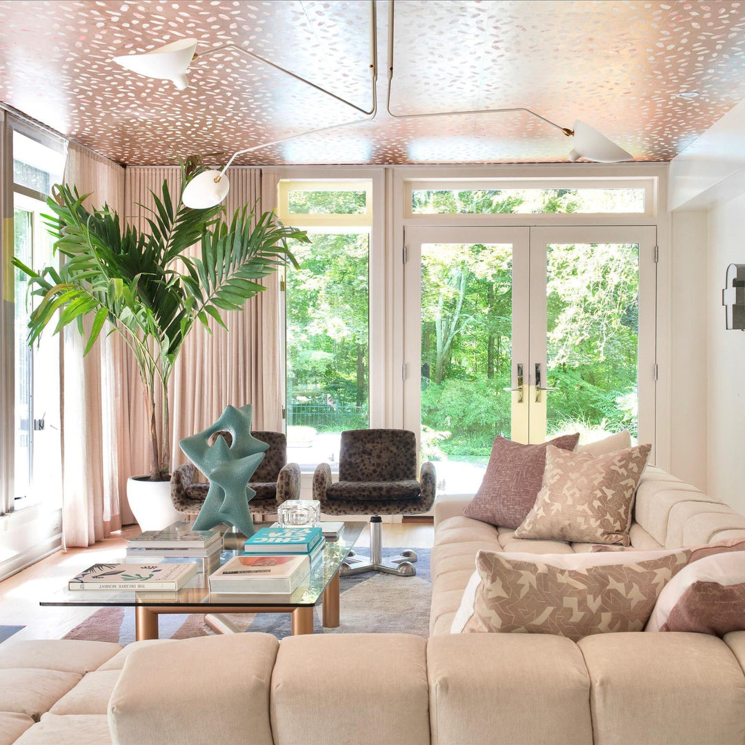 Designer multi-arm adjustable ceiling light, perfect for modern minimalist style.