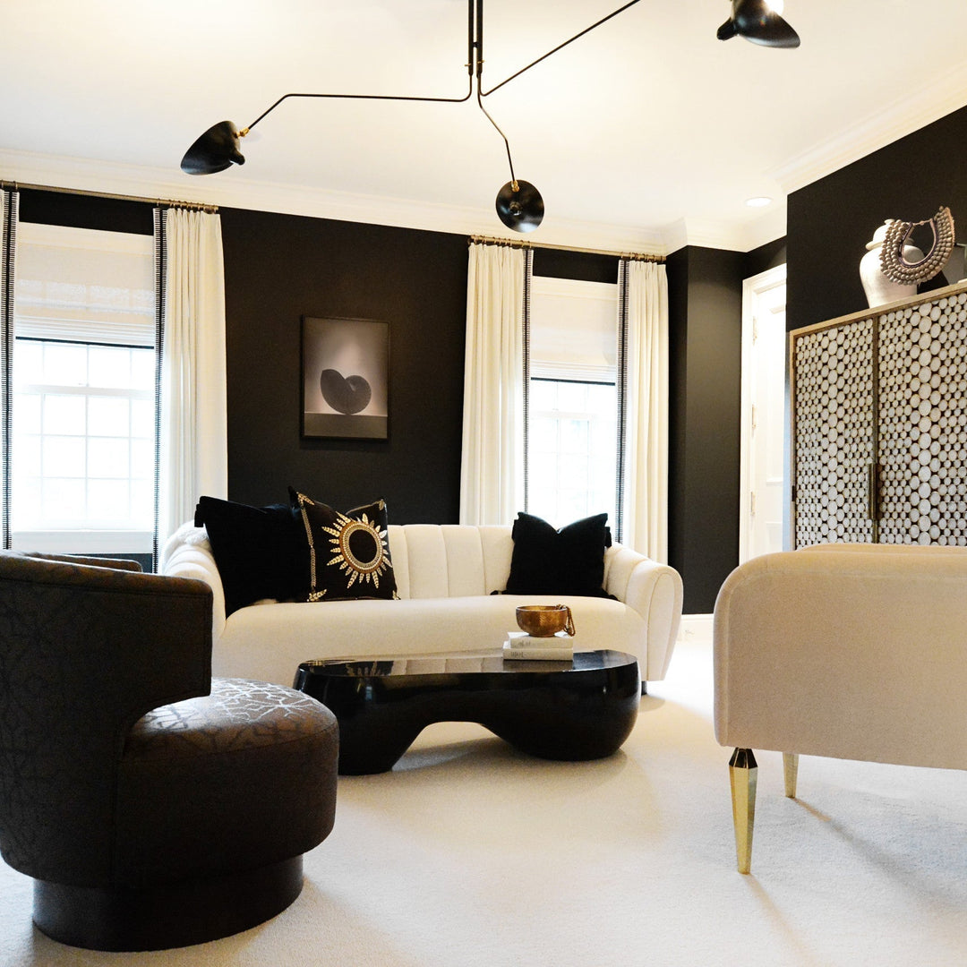 Multi-arm ceiling lamp, adjustable for personalized illumination in any space.