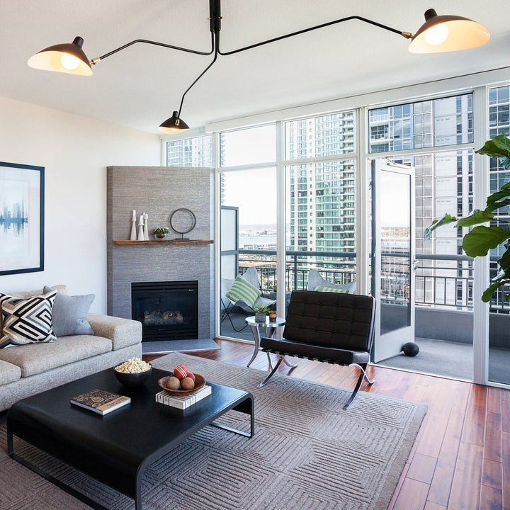 Modern multi-arm ceiling light, providing customizable illumination for bedrooms.
