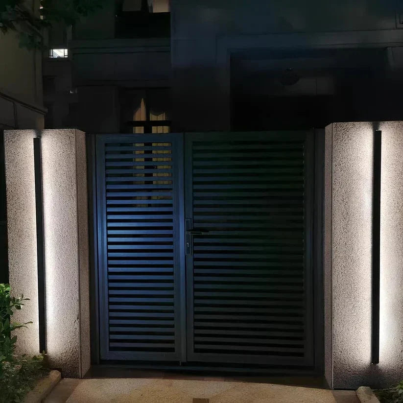 Modern backlit LED outdoor wall sconce for elegant exterior lighting.