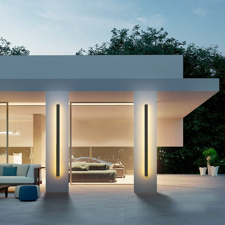 Enhance your entryway with this modern backlit LED outdoor wall sconce.