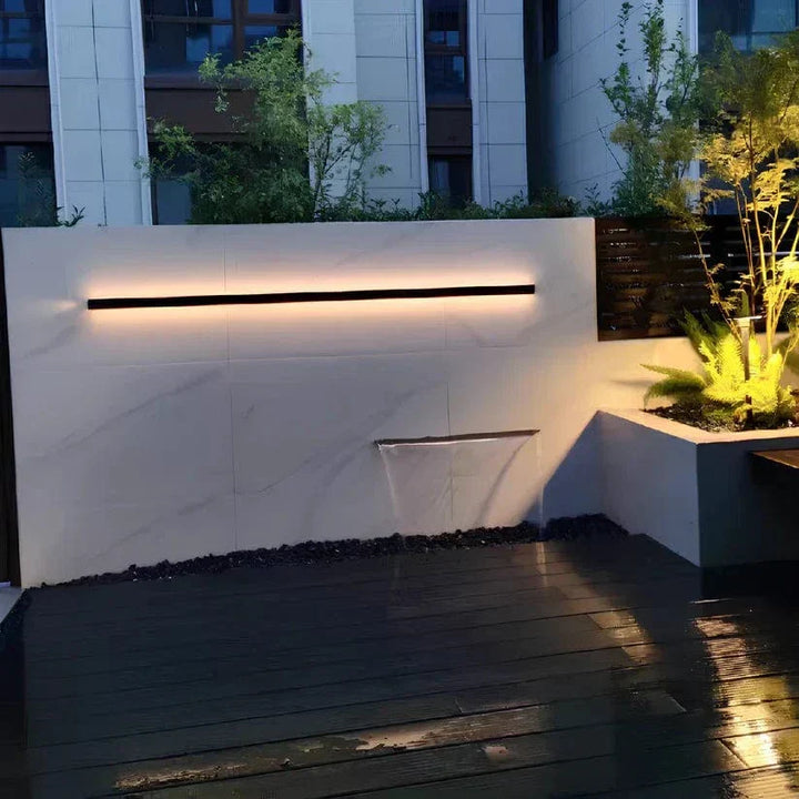 Energy-efficient backlit LED patio light, a modern outdoor wall sconce for homes.