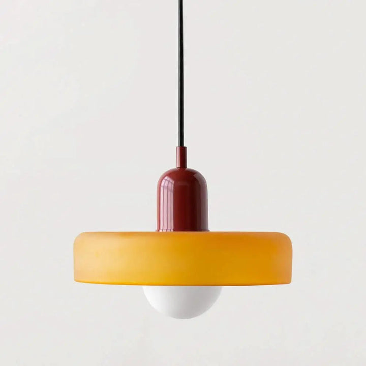 Unique colored glass ceiling light, modern design adding a pop of color to interiors.
