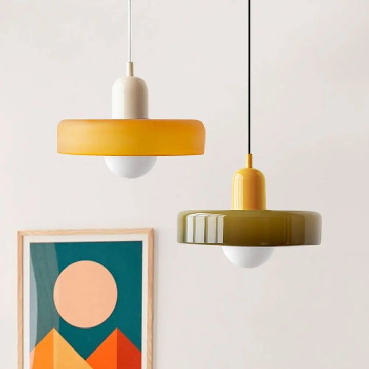 Decorative colored glass pendant, round shape, modern Bauhaus style for elegant homes.