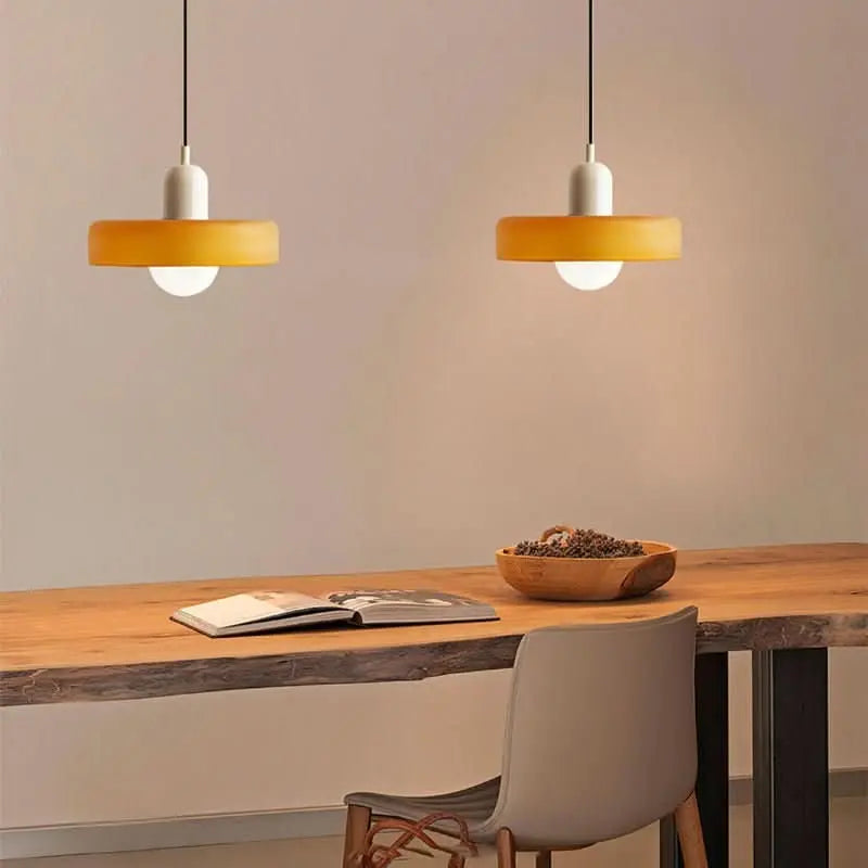 Bauhaus style pendant light, decorative colored glass, perfect for a modern kitchen island.