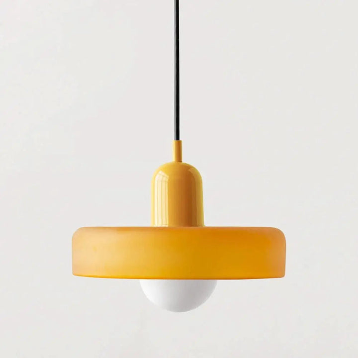 Modern ceiling fixture, vibrant colored glass, illuminating contemporary living rooms.