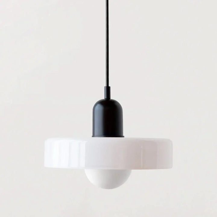 Modern decorative colored glass pendant, perfect for a stylish entryway.
