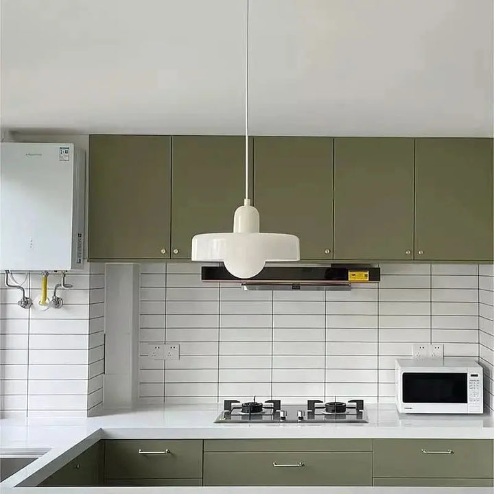 Decorative Bauhaus style pendant, round colored glass, ideal for artistic interiors.