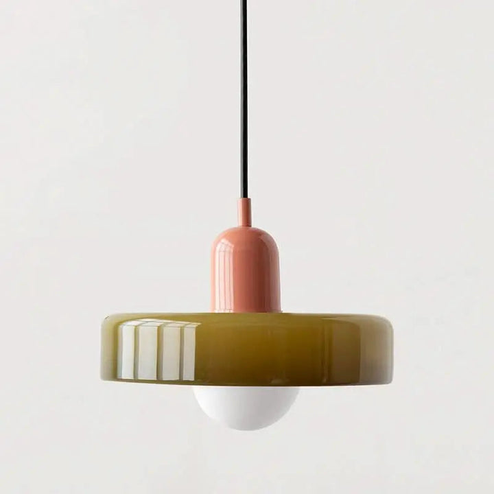 Adjustable modern pendant light, colored glass design for unique interior lighting.