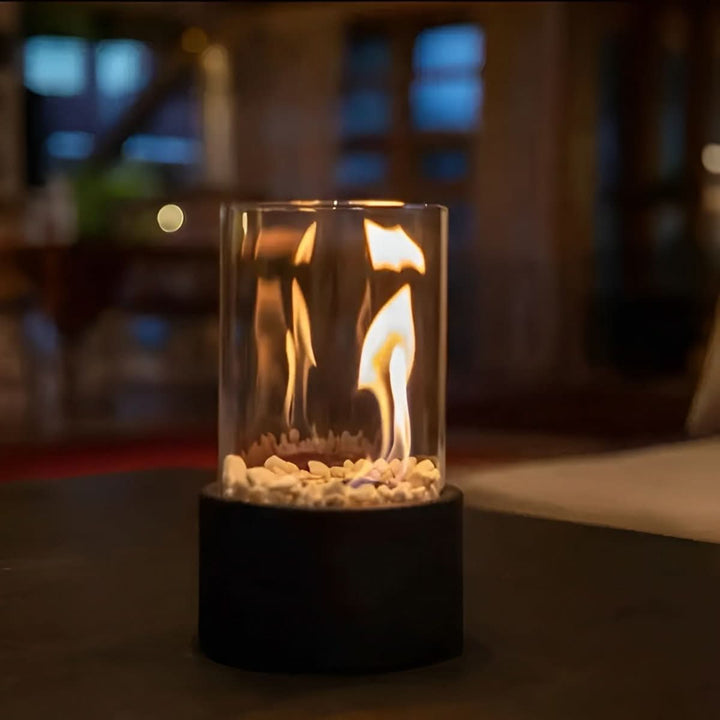 Modern bioethanol table fireplace for indoor/outdoor ambiance. Sleek design with real flame.