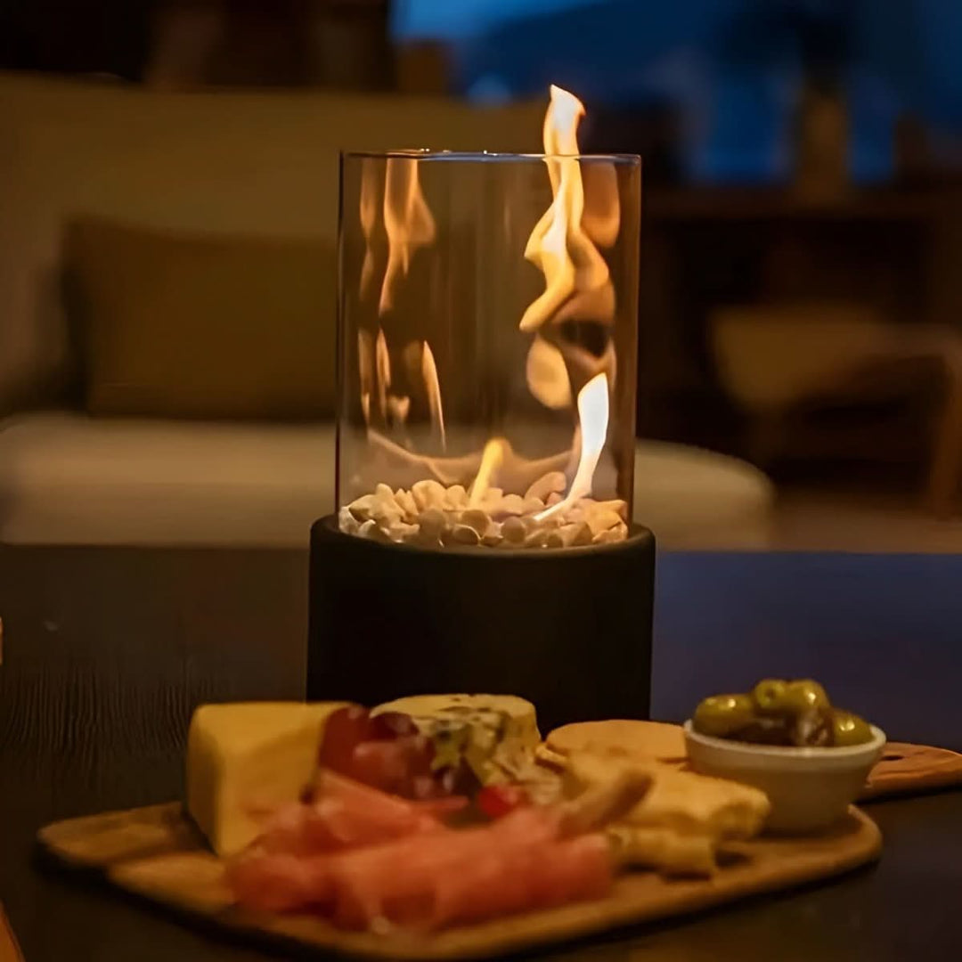 Elegant bioethanol tabletop fireplace. Glass & metal design provides clean burn & cozy flame decor.