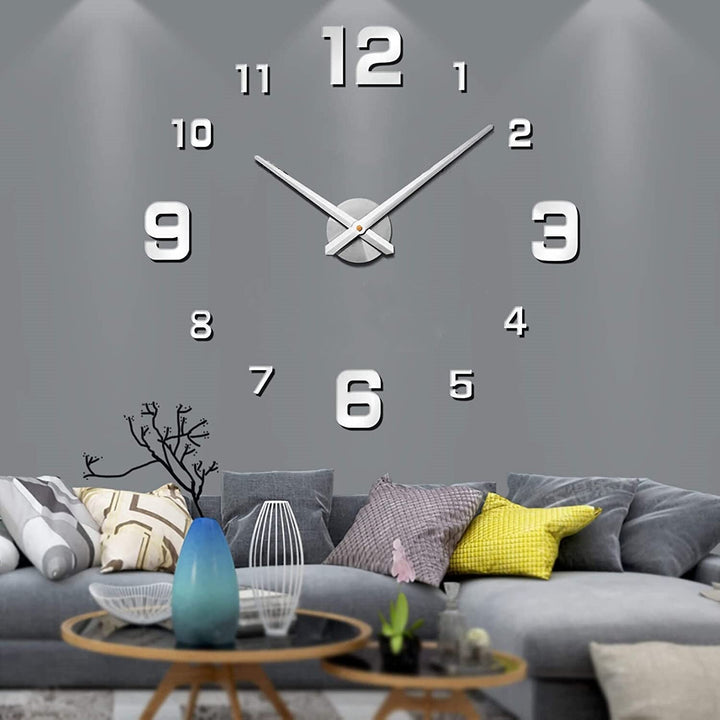 Large black wall clock with geometric design, perfect modern decor for living room or office.