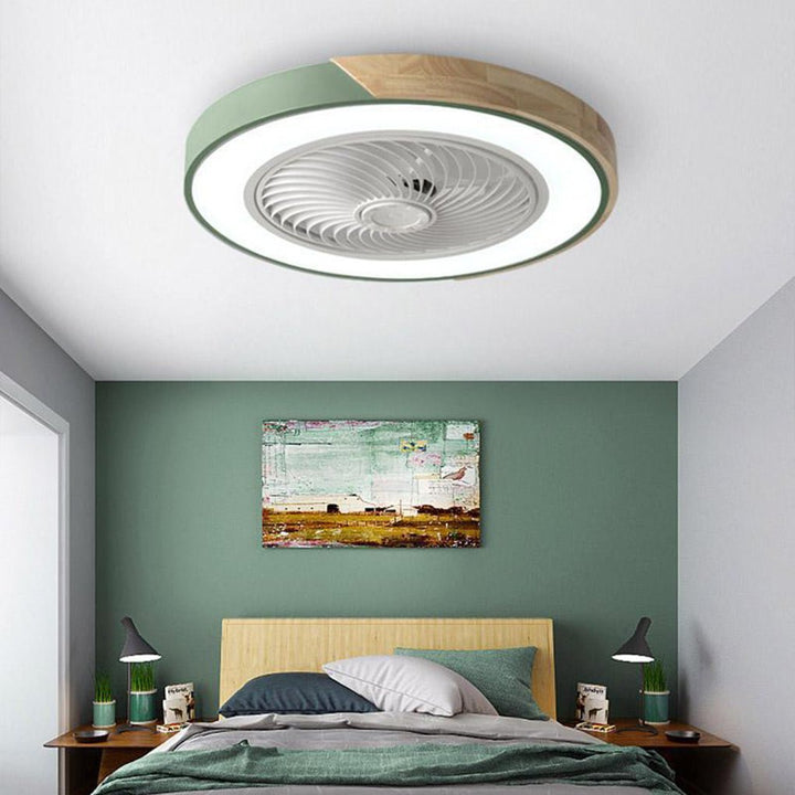 Stylish flush mount bladeless ceiling fan with integrated LED light, ideal for modern home decor.