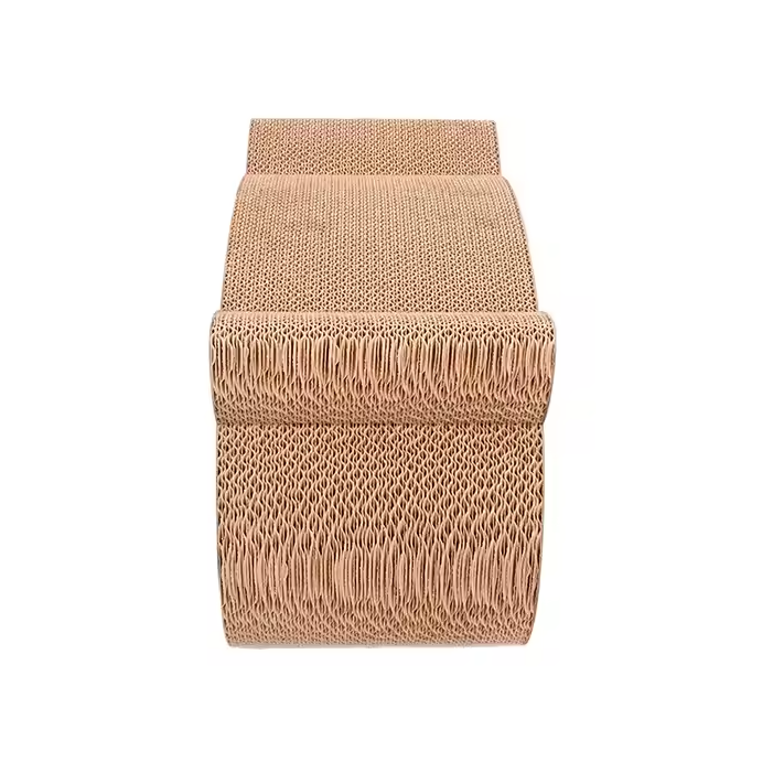 Contemporary cat furniture: a scratching post and comfortable lounger made from sustainable cardboard.