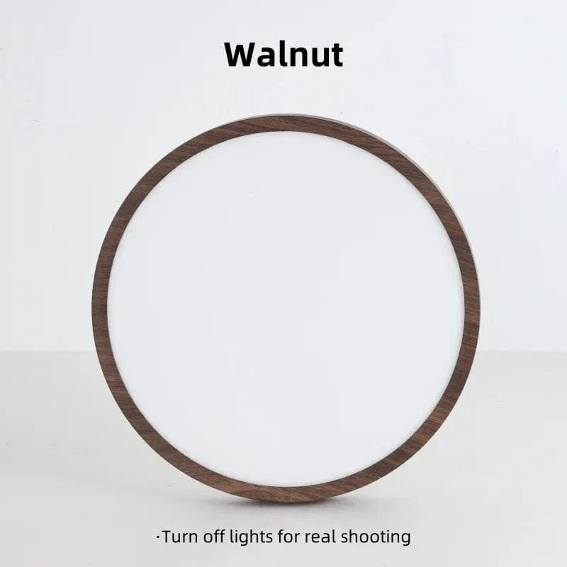 View of modern circular wooden LED ceiling light mounted. Energy-efficient and stylish.