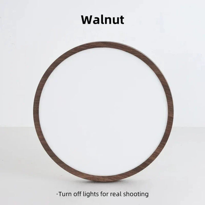 View of modern circular wooden LED ceiling light mounted. Energy-efficient and stylish.