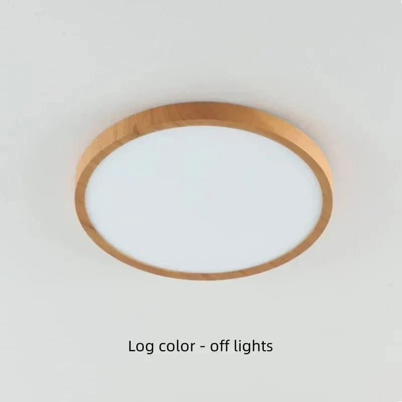 Close-up of the natural wood finish on circular LED ceiling light. Modern, energy-efficient.