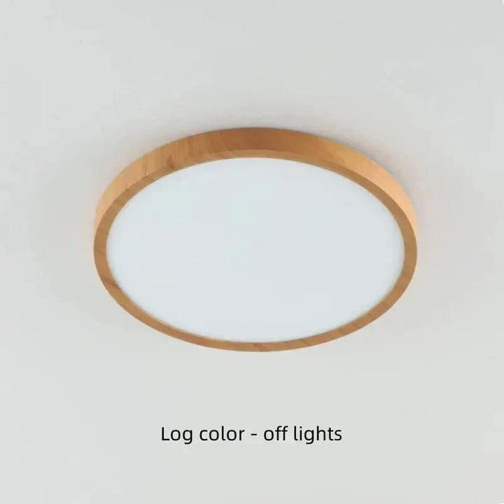Close-up of the natural wood finish on circular LED ceiling light. Modern, energy-efficient.