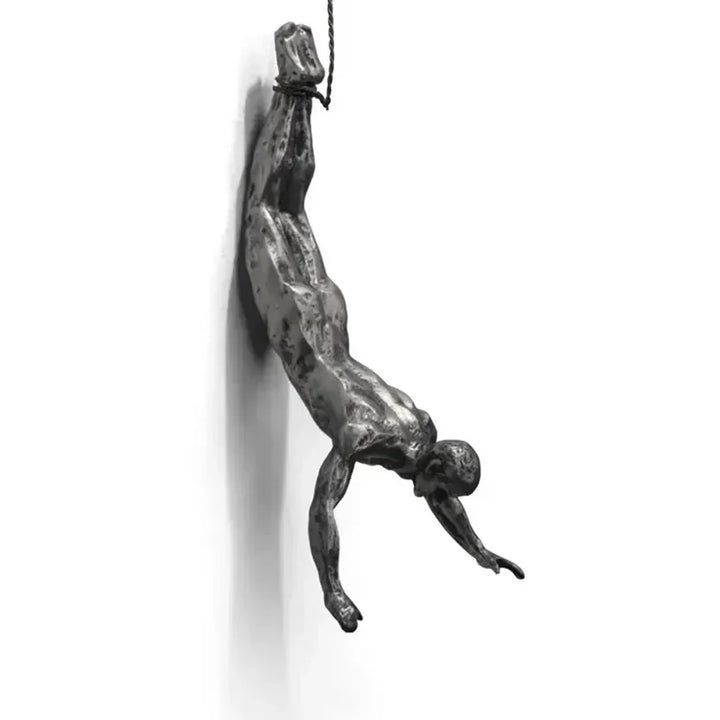 Sleek modern climbing figures wall sculpture set for sophisticated decor.