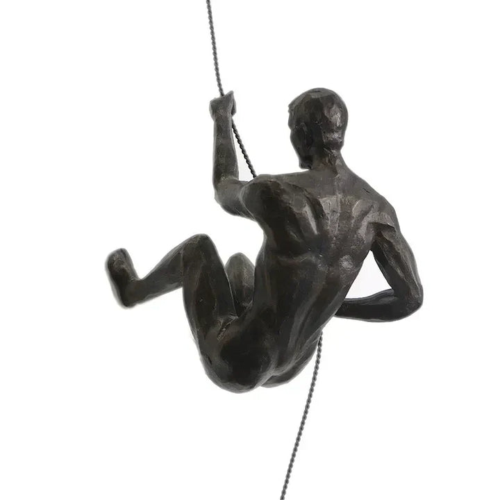 Unique decorative climbing figures wall sculpture for modern interiors.