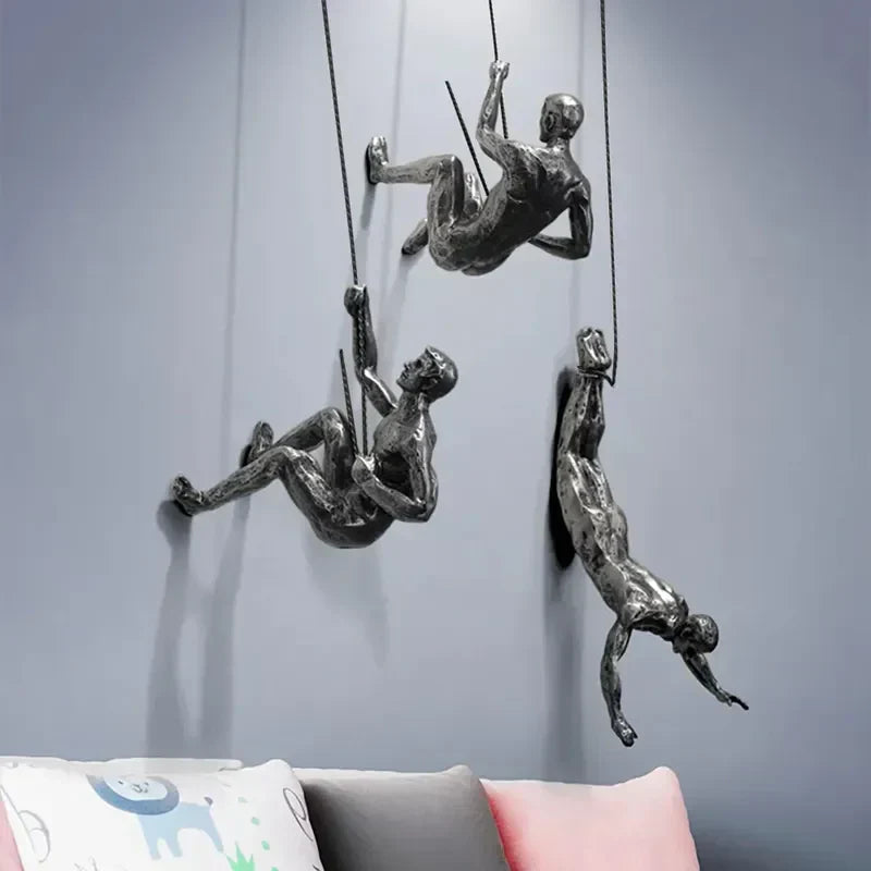 Decorative climbing figures wall decor, a striking modern home accent set.