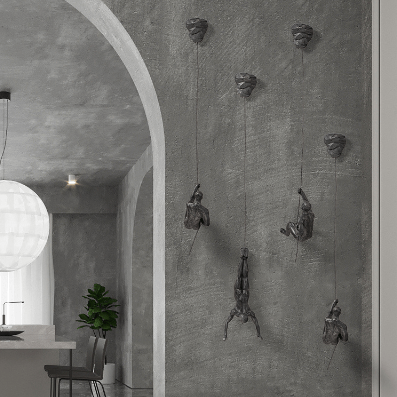 Contemporary climbing figures wall sculpture set to enhance your decor.