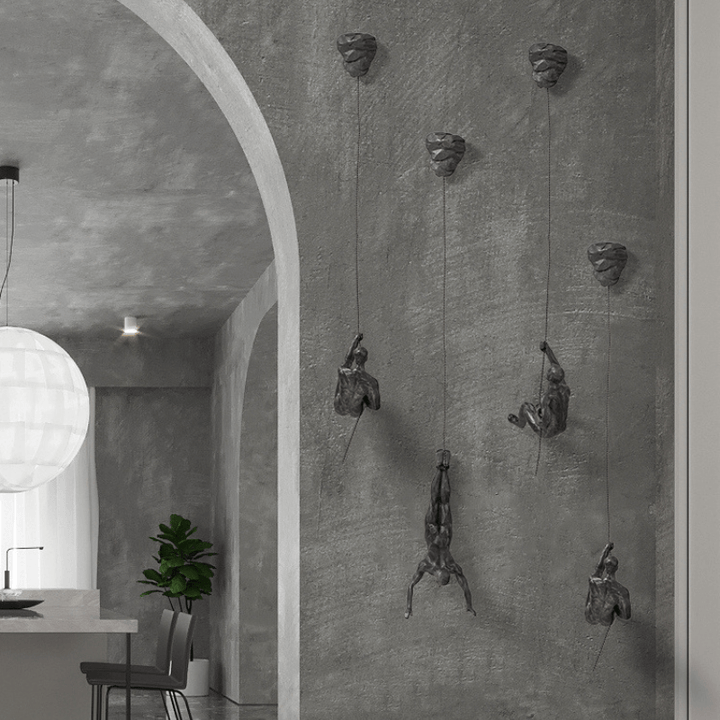 Contemporary climbing figures wall sculpture set to enhance your decor.