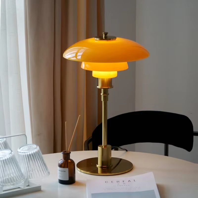 Modern Danish LED table lamp, warm ambient glow for Scandinavian home decor and lighting.