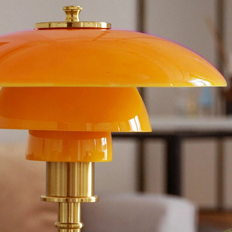Modern Danish LED desk lamp, warm ambient illumination, for a cozy and stylish home space.