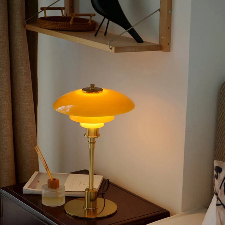 Stylish LED table lamp, modern design, provides warm ambient light for any room or desk.