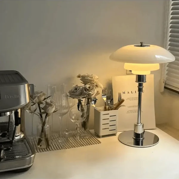 Accent LED lamp, warm ambient light, modern Danish style for elegant home decor and spaces.
