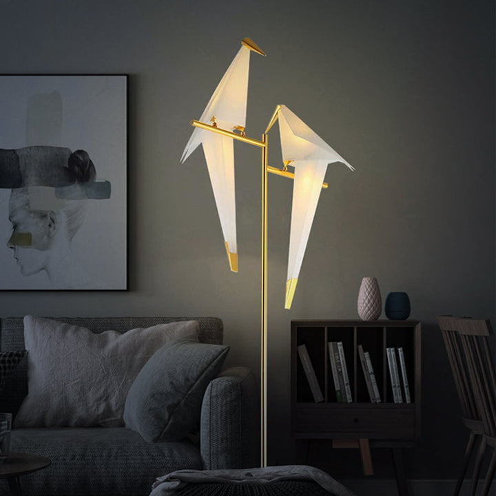 Modern decorative origami bird lamp with magnetic base, providing soft ambient LED lighting for home decor.