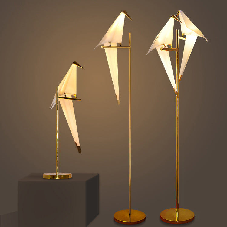 Decorative origami bird LED lamp with magnetic attachment, perfect as a unique table or accent light for modern homes.
