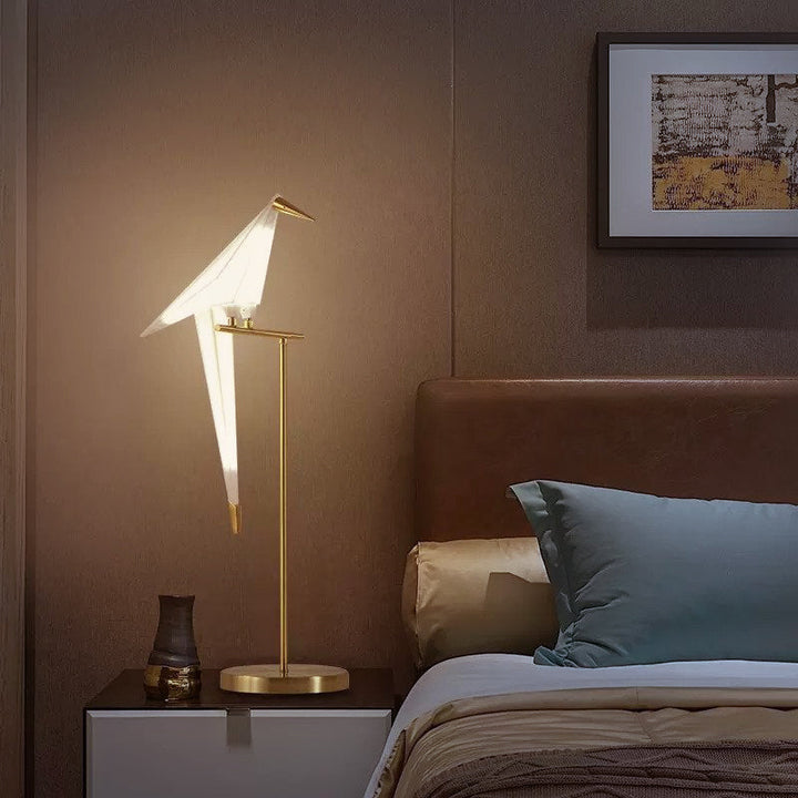 Creative origami bird desk lamp offering soft ambient LED light. Magnetic, wireless, and decorative for modern home decor.