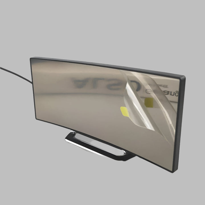 Close-up of a digital alarm clock with a curved LED screen and snooze button, great for any room.