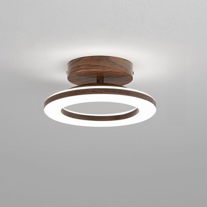 Modern LED disc ceiling light, round design for contemporary home decor and bright illumination.