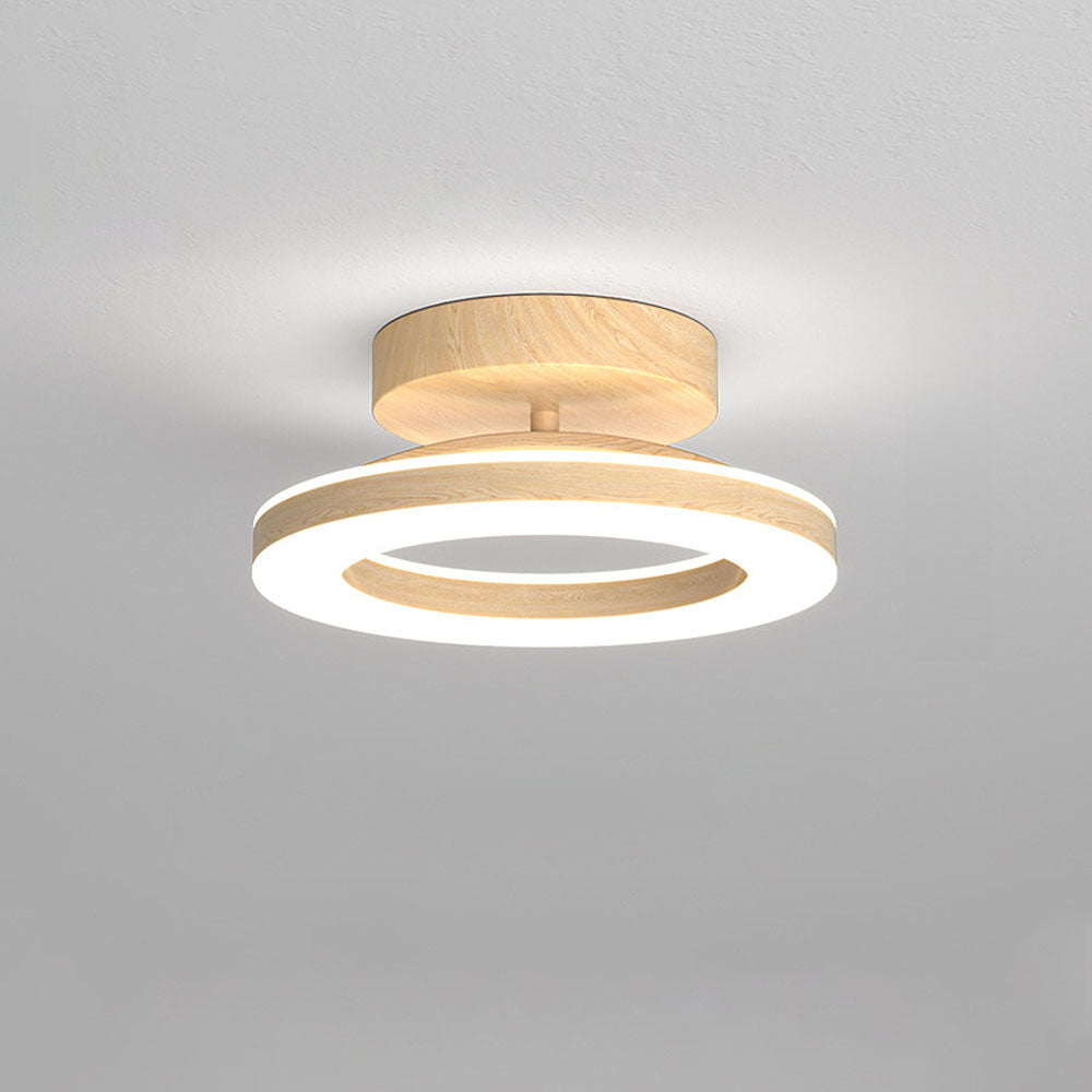 Contemporary round LED ceiling light fixture, Modern Glow Disc, perfect for chic home illumination.