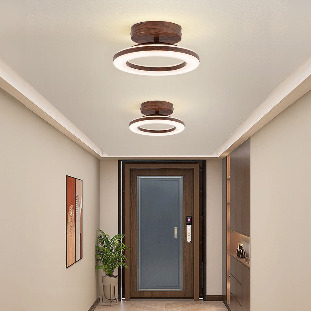 Chic modern disc LED ceiling lamp, a round fixture bringing contemporary style and neutral light.