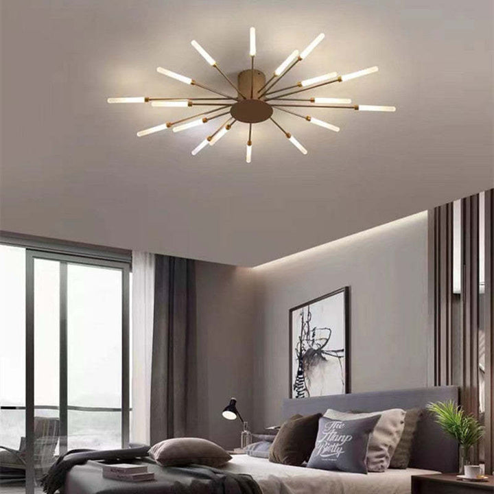 Contemporary black LED chandelier, abstract fireworks design, offers dimmable light.