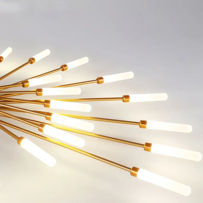 Ambient LED lighting: a modern fireworks design ceiling chandelier in gold finish.