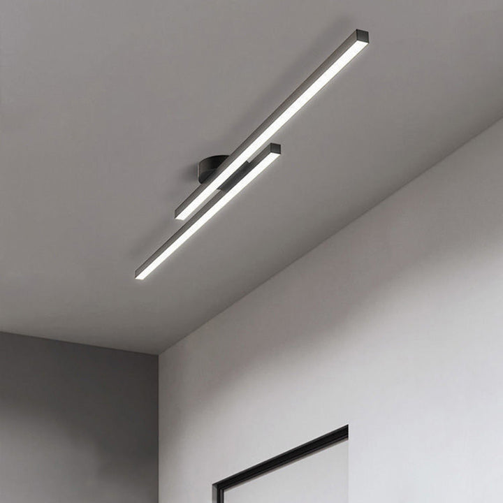 Modern LED ceiling lamp, multi-color, creating dynamic ambient light for homes.