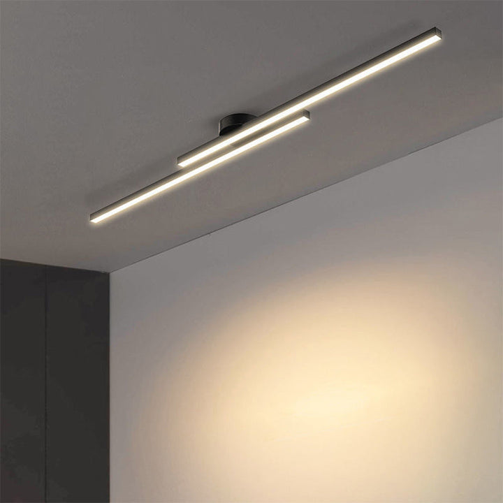 Dimmable LED ceiling fixture, modern design, provides versatile ambient lighting.