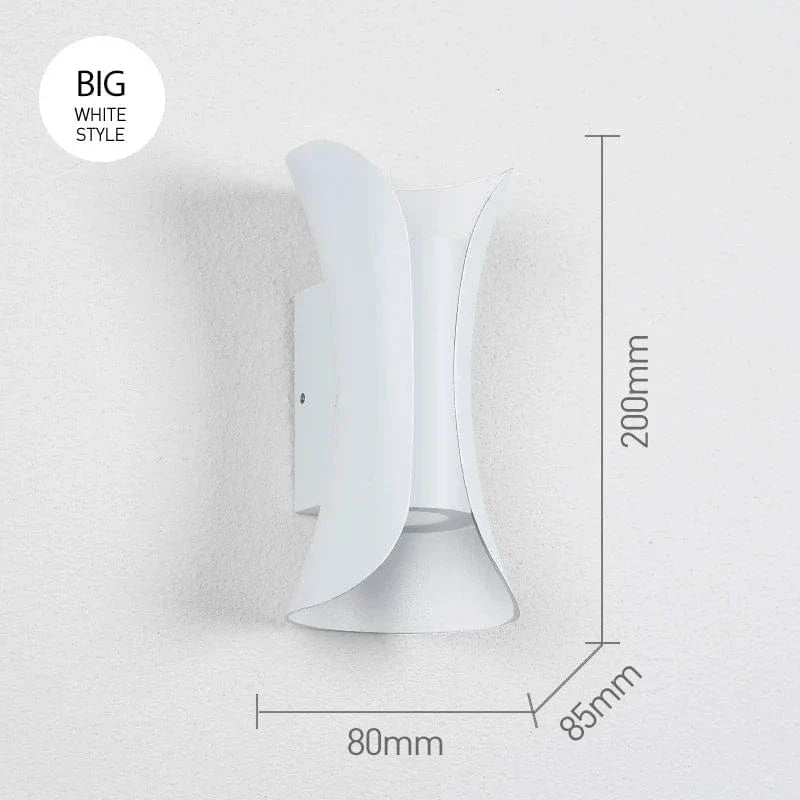 Waterproof LED wall light, perfect for outdoor garden lighting or stylish indoor accent. Modern design.
