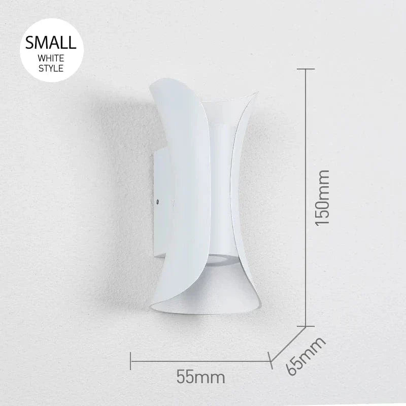 Sleek modern LED wall light, waterproof for both indoor and exterior home decor. Accent lighting.