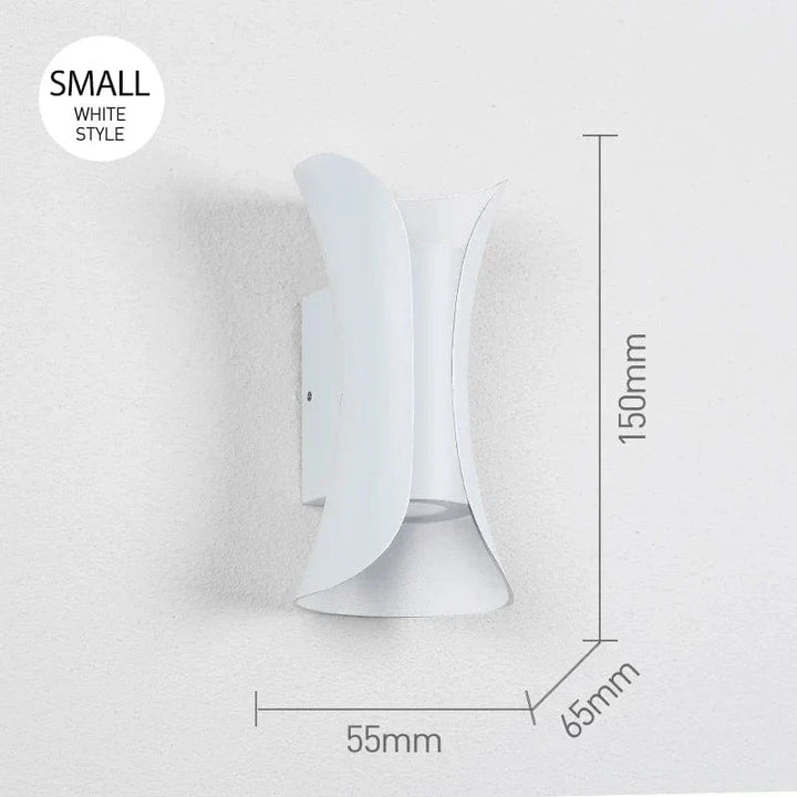 Sleek modern LED wall light, waterproof for both indoor and exterior home decor. Accent lighting.