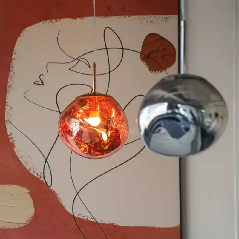 Polished silver Melt ceiling lamp, modern home decor, statement piece lighting.