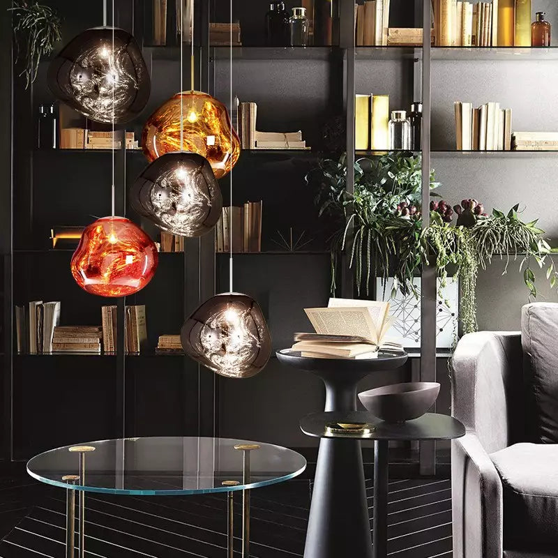 Contemporary silver Melt pendant lamp, ideal for modern dining room lighting.