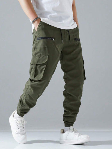 Men's casual cargo pants, emphasizing secure zipper pockets, utility, and stylish urban comfort.