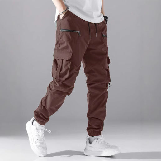 Detailed fabric texture of men's utility cargo pants, emphasizing durability and urban appeal.